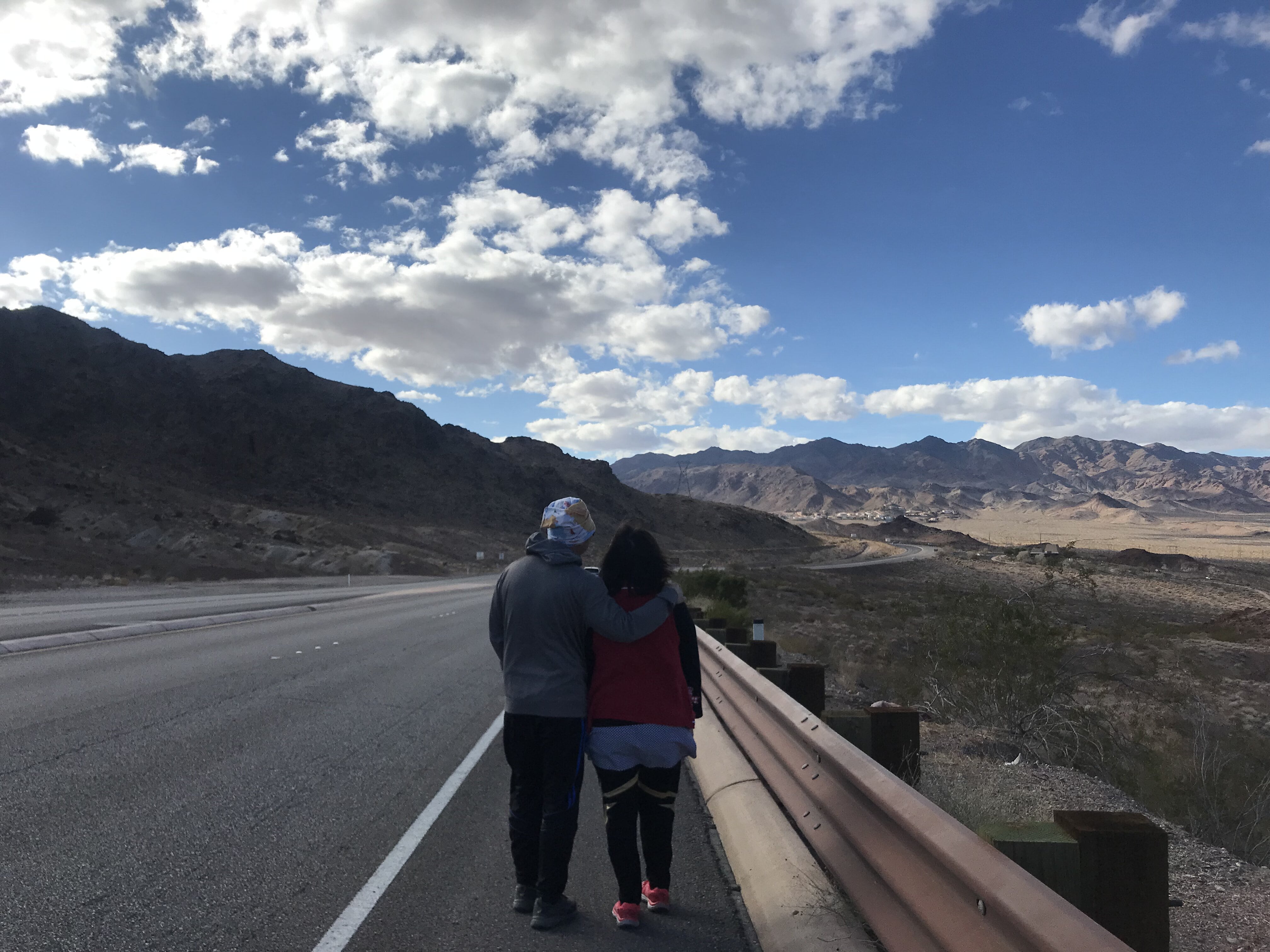 Carlos and Tess going on a hike - marriage article