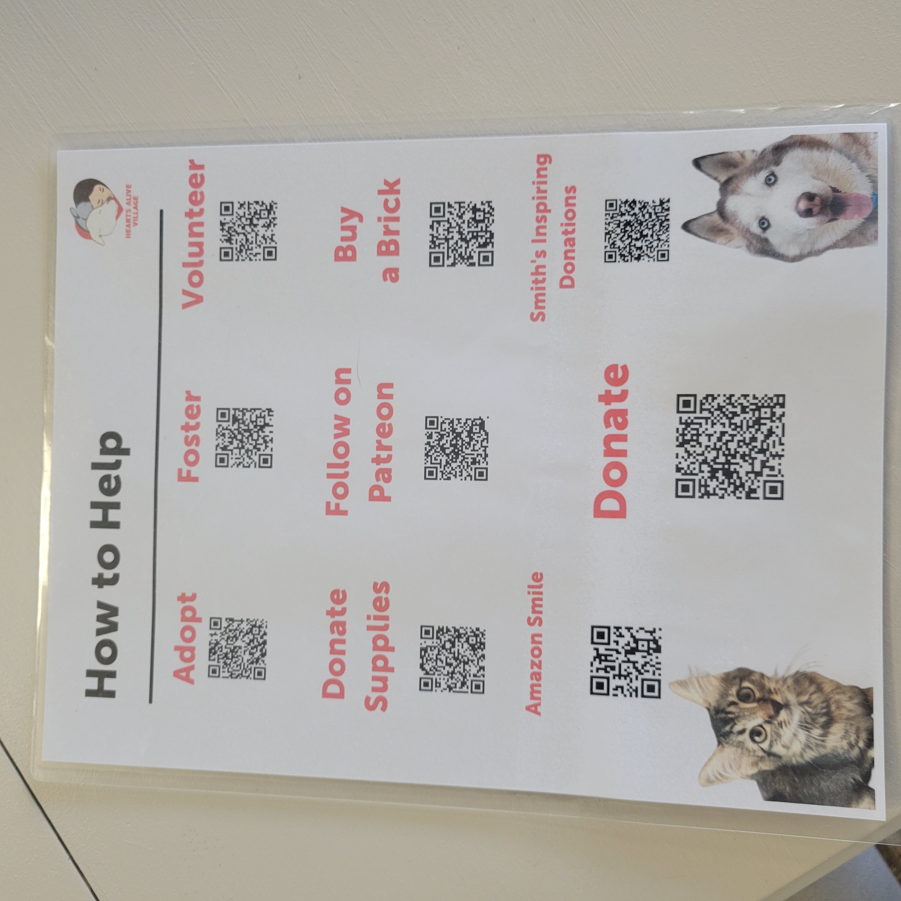 Image of a flyer with various QR codes for people to scan with opportunities to get involved with Hearts Alive Village  