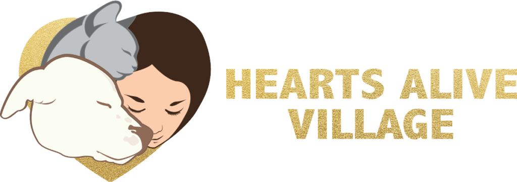 Hearts Alive Village logo, with a drawing of a person with their eyes closed leaning up against a white dog and a gray cat that also have their eyes closed, all cuddling together. 